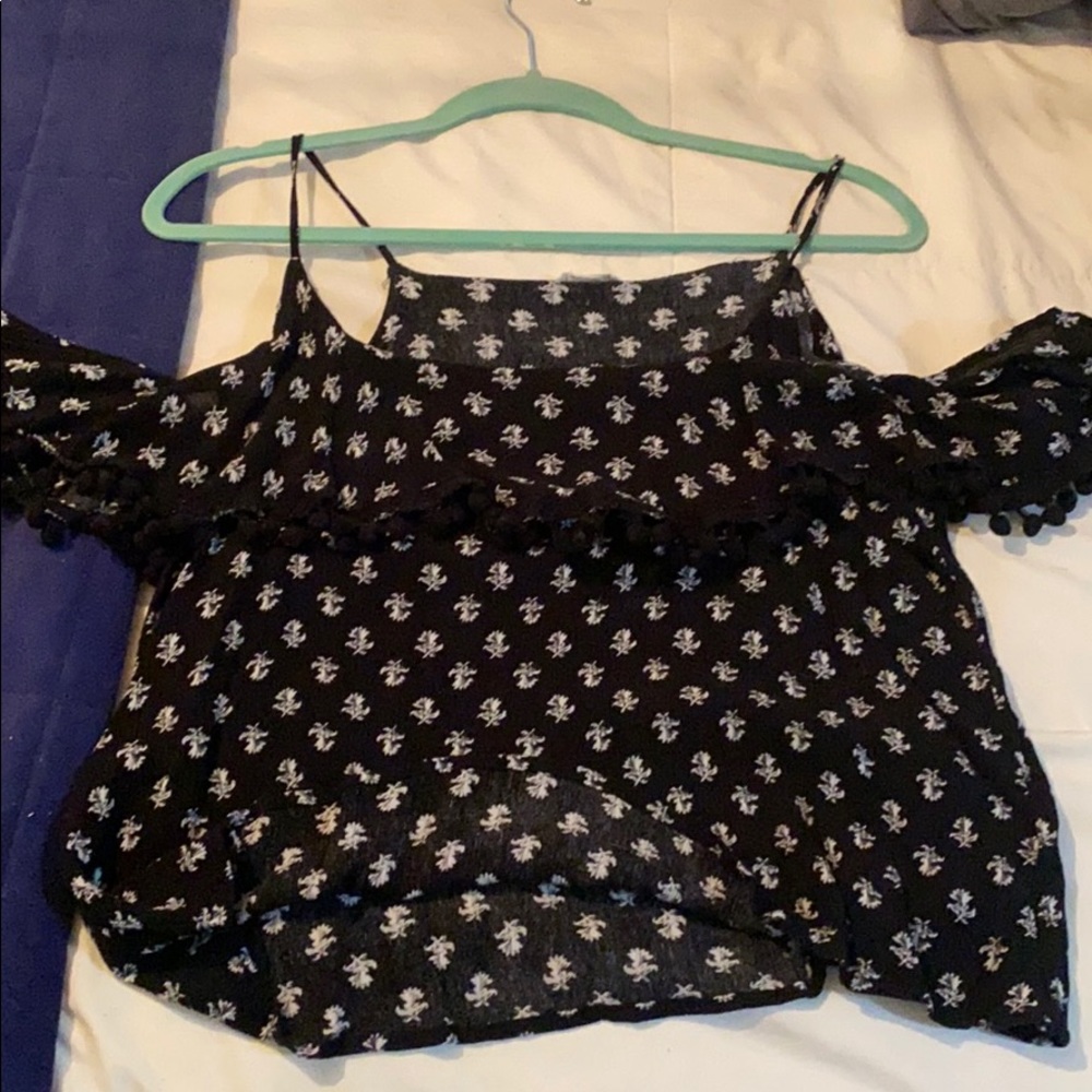Loose fitting blouse over the shoulders super cute